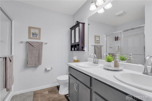 1605 Ashbury Ct, Franklin, OH 45005 - full bath featuring a stall shower, visible vents, a sink, and double vanity