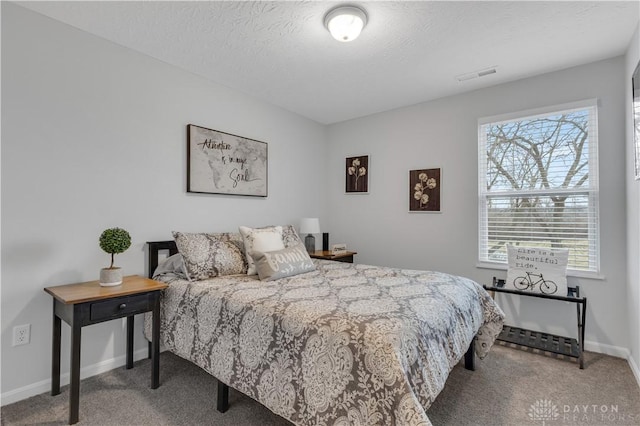1605 Ashbury Ct, Franklin, OH 45005 - bedroom with carpet floors, visible vents, a textured ceiling, and baseboards