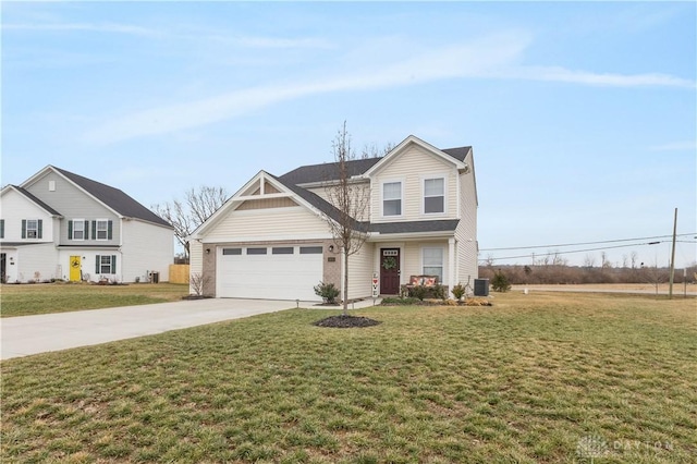 traditional-style home featuring driveway, an attached garage, a front lawn, and central AC