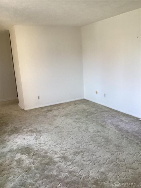 spare room with carpet flooring