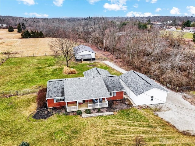 birds eye view of property featuring a rural view