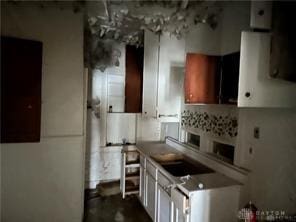 kitchen with white cabinetry