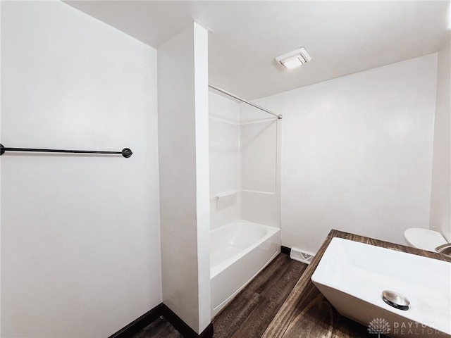 bathroom featuring wood-type flooring