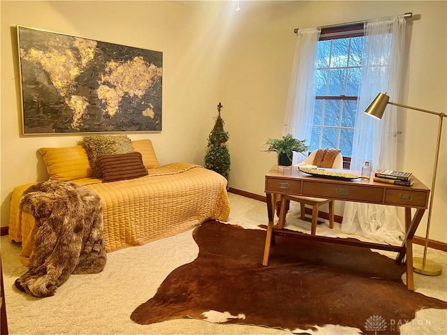 bedroom with light colored carpet