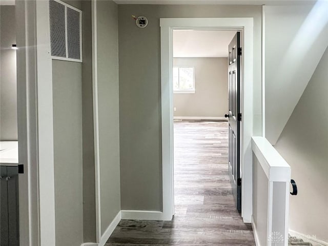 corridor featuring light hardwood / wood-style flooring