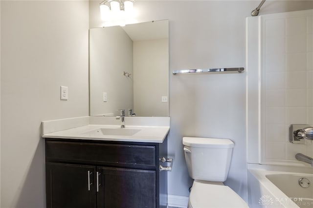 full bathroom with vanity, bathtub / shower combination, and toilet