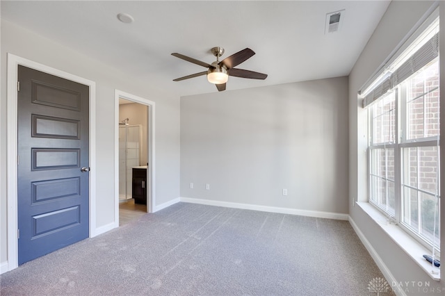 carpeted empty room with ceiling fan