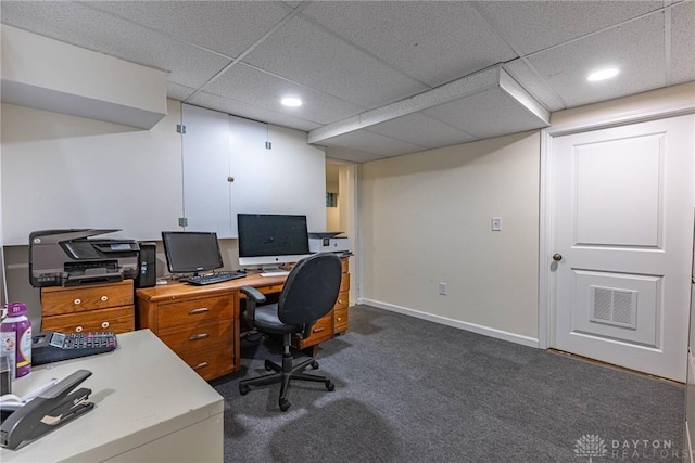 carpeted office featuring a drop ceiling