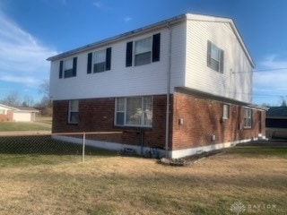 exterior space with a front lawn