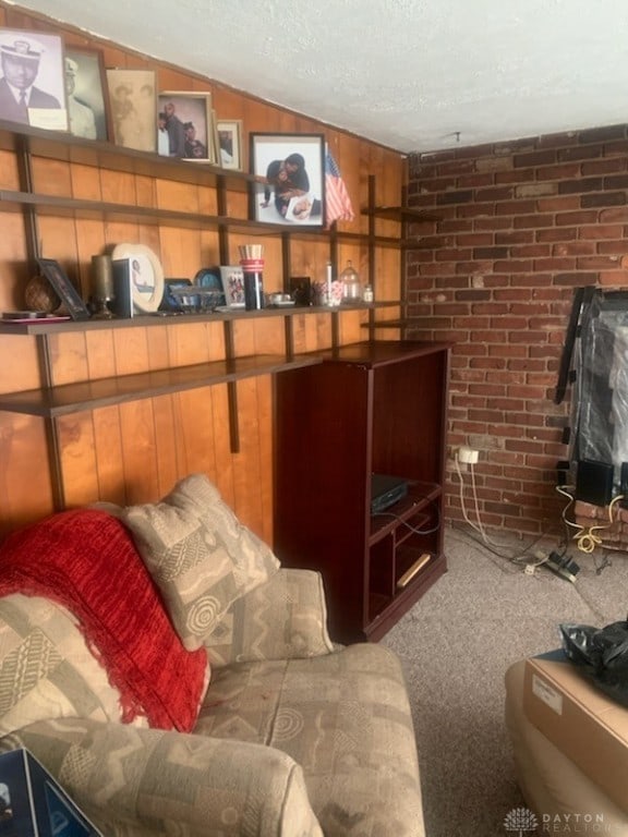 interior space featuring lofted ceiling, carpet, and a textured ceiling