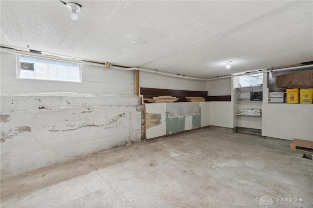 basement with a textured ceiling