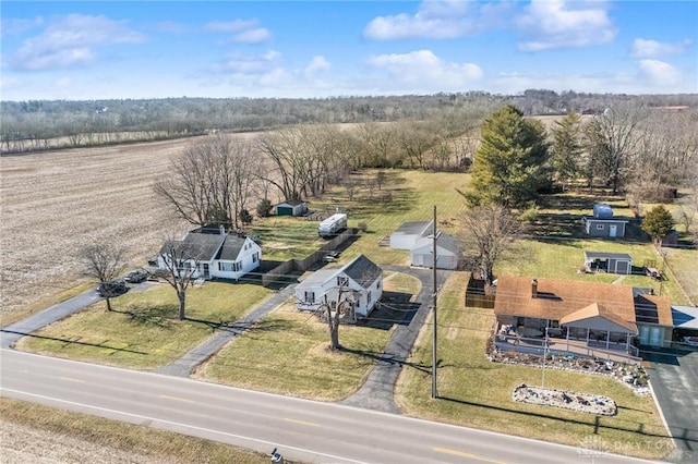 birds eye view of property featuring a rural view