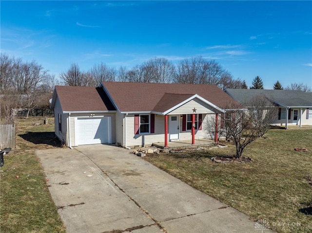 ranch-style home with a garage, a front lawn, and covered porch