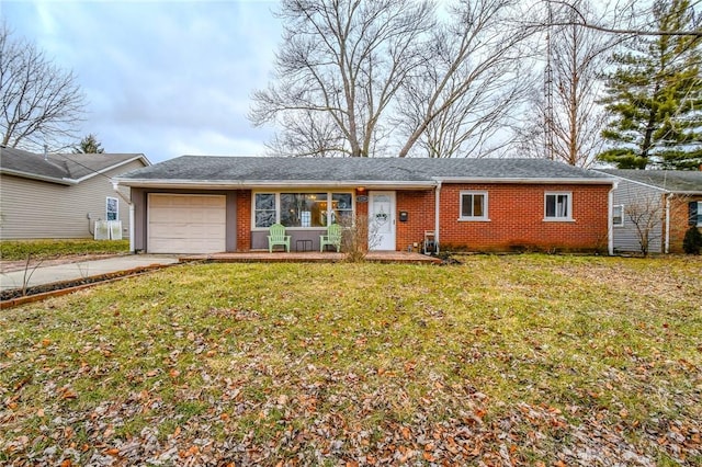 single story home with an attached garage, brick siding, driveway, roof with shingles, and a front yard