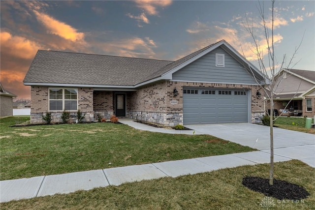 2220 Tandem Dr, Xenia, OH 45385 - view of front of house with a garage and a lawn