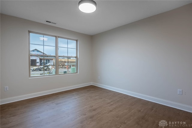 2220 Tandem Dr, Xenia, OH 45385 - unfurnished room with dark wood-type flooring