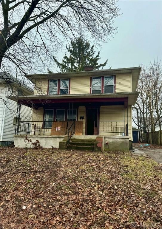 front facade with a porch