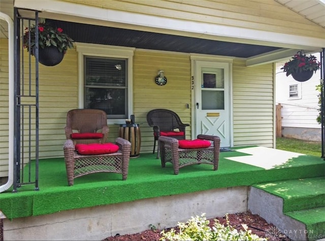 view of patio featuring a porch