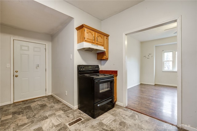 kitchen featuring electric range