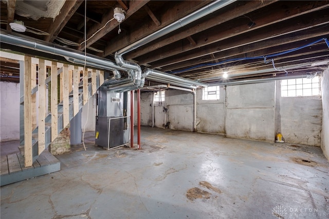 basement featuring heating unit