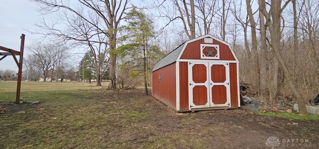 view of outdoor structure featuring a yard