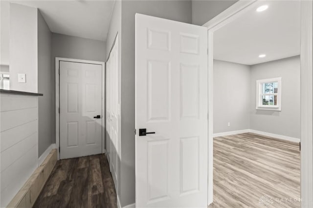 hallway featuring hardwood / wood-style flooring