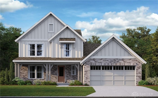 view of front facade featuring a garage, a front lawn, and covered porch