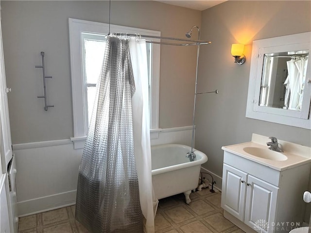 bathroom featuring vanity and shower / bath combo