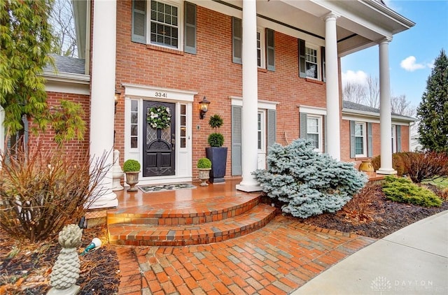 entrance to property with covered porch