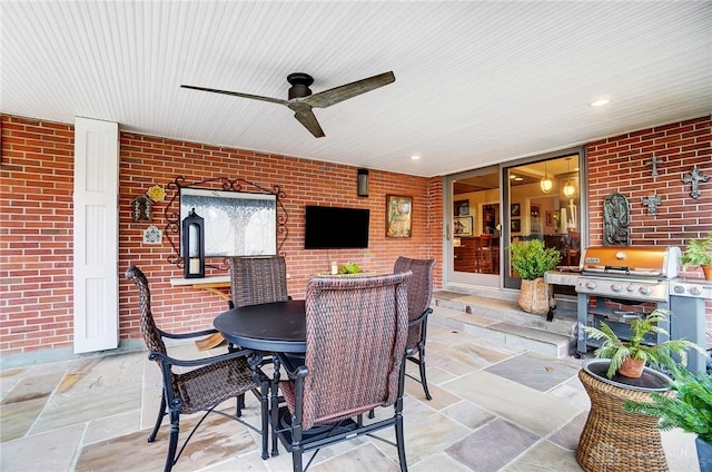 view of patio featuring ceiling fan and area for grilling