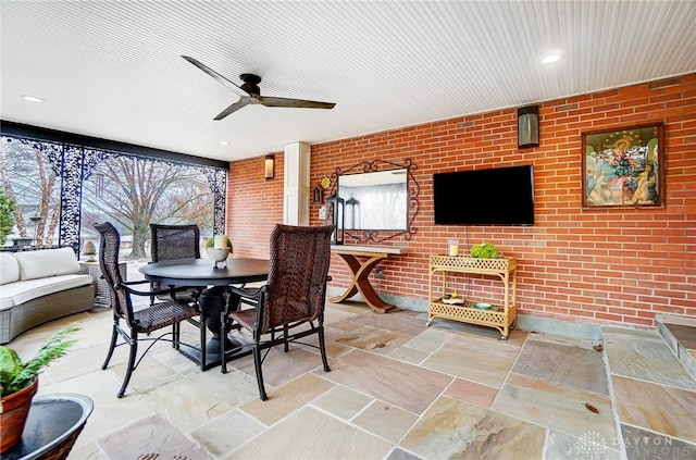 view of patio / terrace featuring an outdoor living space and ceiling fan