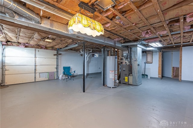 basement featuring gas water heater and heating unit