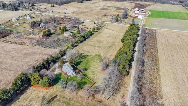 birds eye view of property featuring a rural view