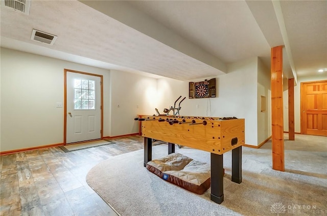 game room featuring hardwood / wood-style flooring