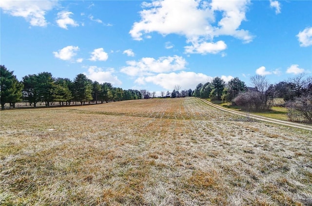 exterior space with a rural view