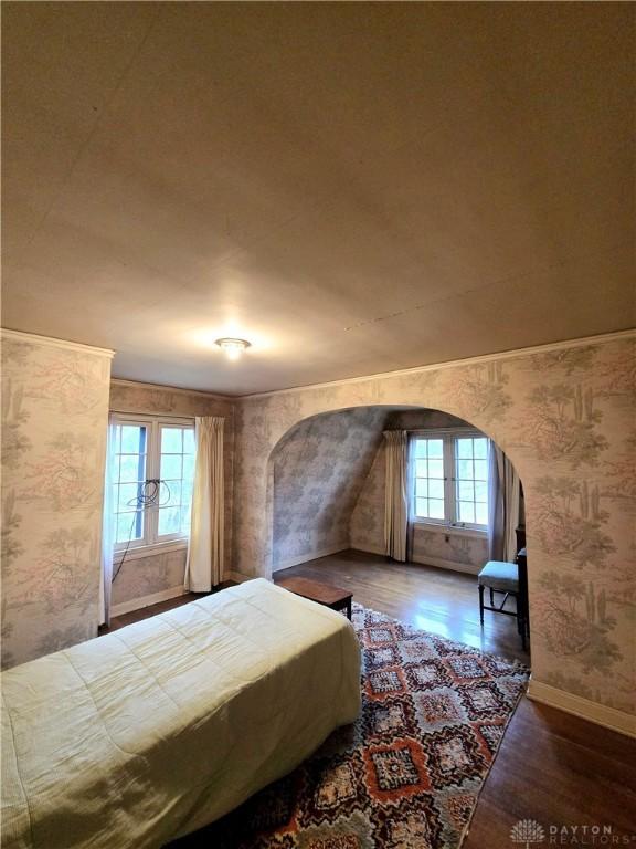 bedroom featuring dark hardwood / wood-style flooring