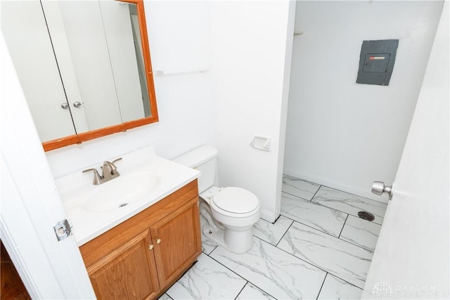 bathroom featuring electric panel, vanity, and toilet