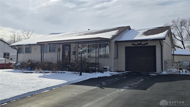 ranch-style home with a garage