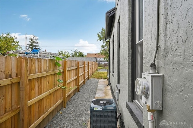 view of yard with central AC unit