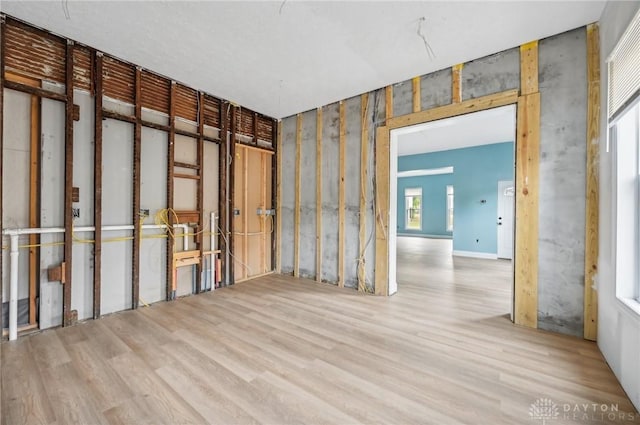 spare room with light wood-type flooring