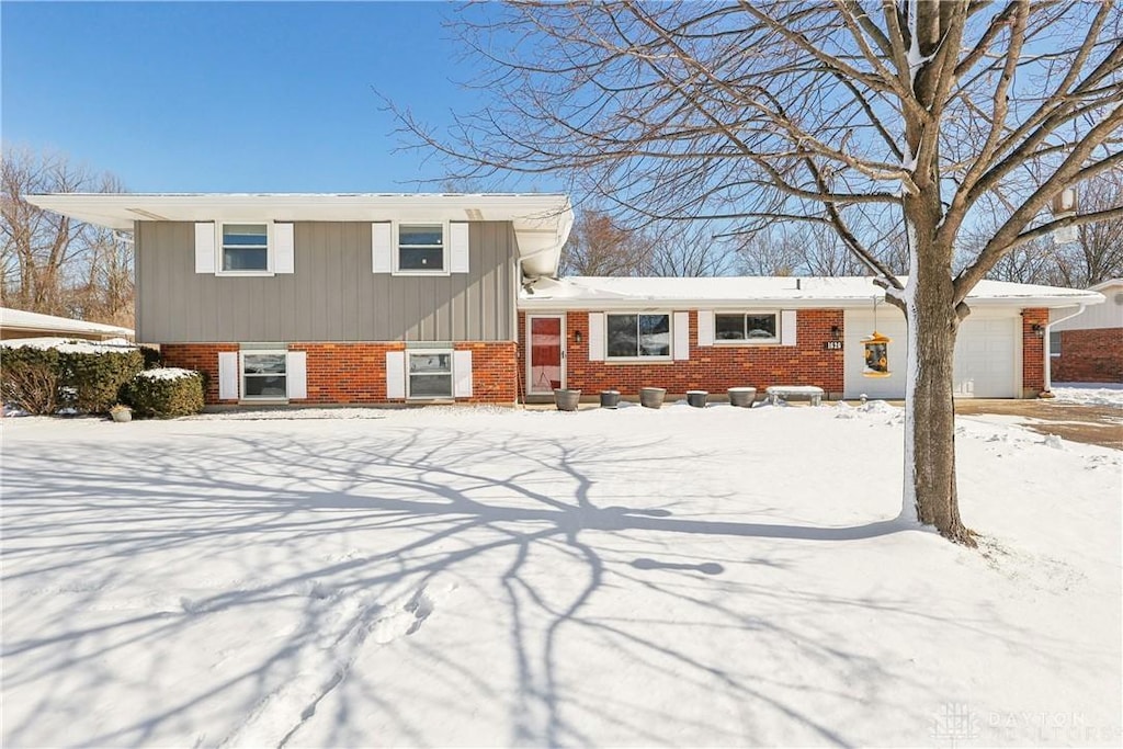 split level home featuring a garage