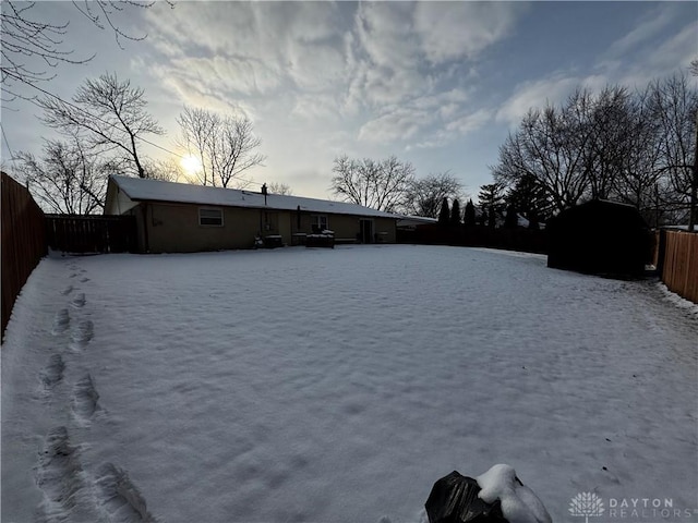 view of yard covered in snow