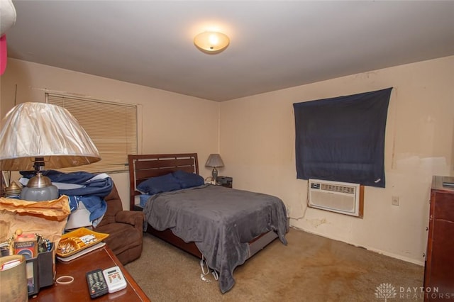 bedroom with carpet floors and a wall mounted AC