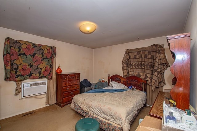 bedroom featuring an AC wall unit and carpet flooring