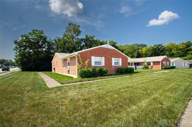 view of home's exterior featuring a yard