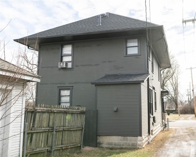 back of house with cooling unit