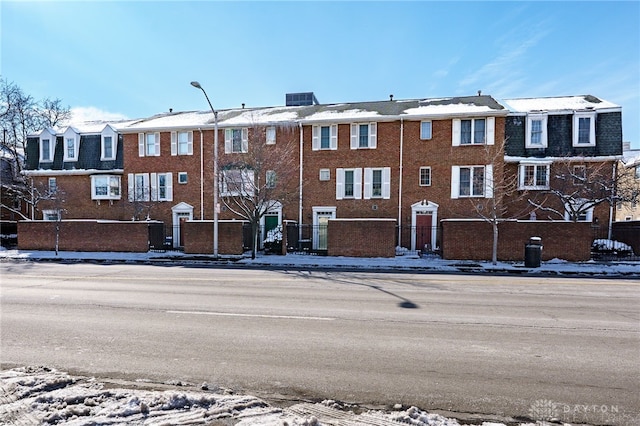 view of snow covered building