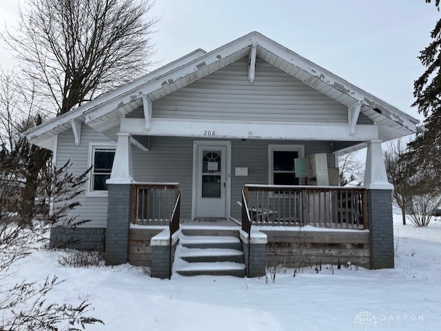 bungalow-style house featuring covered porch