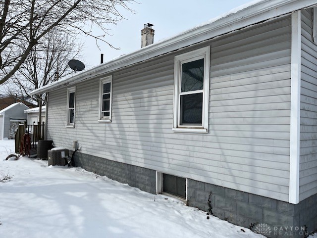 view of snow covered property