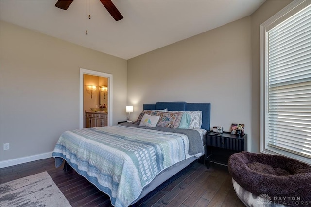 bedroom featuring connected bathroom, ceiling fan, and dark hardwood / wood-style floors